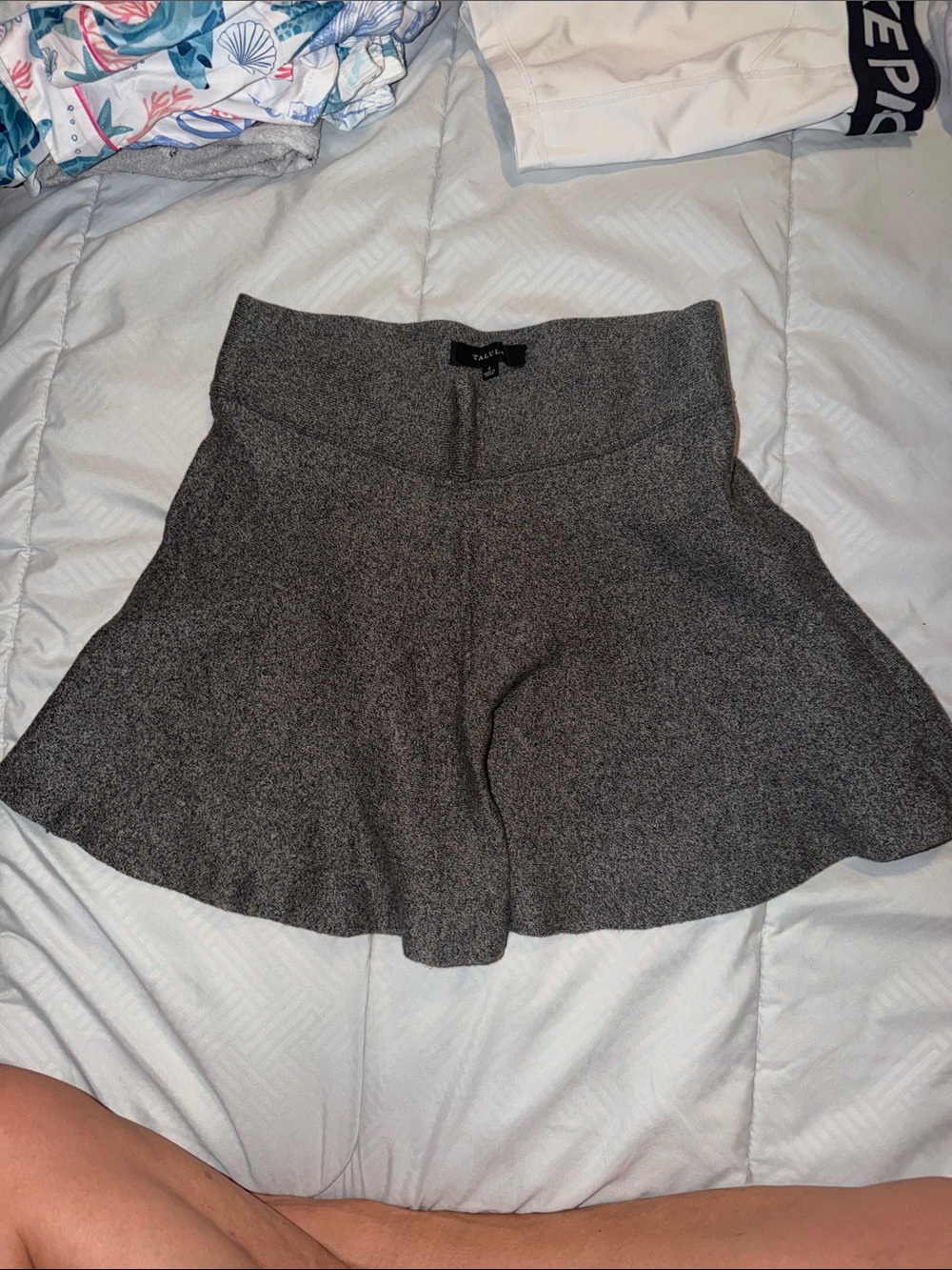 gray skirt by Talula features a structured, high-waisted fit